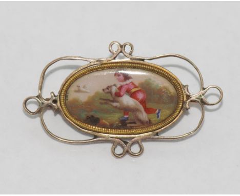 Edwardian gold & enamel brooch with boy & dog scene. Blue enamel on reverse.