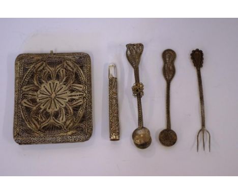 Five antique filigree silver items to include a cigarette case 9.5cm x 7.5cm, sugar tongs, spoon, fork and 1 other, 98 grams