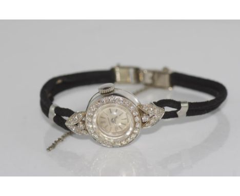 Vintage Certina 18ct white gold & diamond watch with cord band
