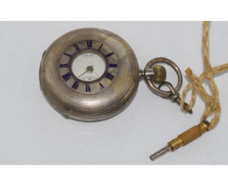 Sterling silver half hunter pocket watch with blue enamel numerals. Retailed by Hardy Bros Sydney.