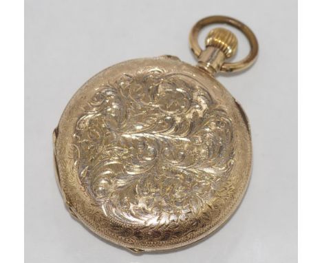 Ladies gold pocket watch with engraved case, white enamel dial with black Arabic numerals. Stamped 9K. 35mm across the middle