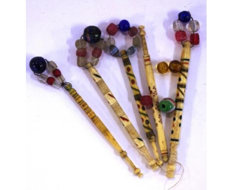 Five vintage bone lace bobbins