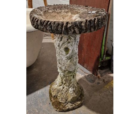 Composite stone bird bath, the pedestal in the form of a tree trunk, 68cms h.