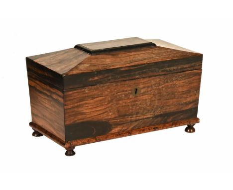 Rosewood sarcophagus tea caddy with central glass liner 