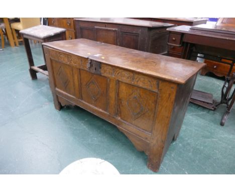18th century oak three panelled coffer with carved frieze and diamond pattern to each panel, on stile feet, height 62 cm, wid