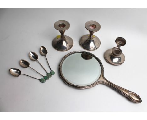 Pair of silver candlesticks, silver inkwell, mirror and white metal teaspoons stamped 90%