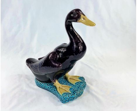 A Chinese 'majolica' duck, height 32cm; a Chinese hardwood covered rectangular box with mother-of-pearl inly, length 26 cm; a