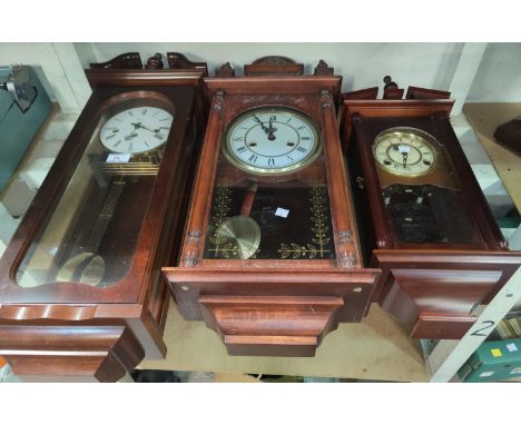 A 'Woodford' German reproduction wall clock and two other similar clocks 