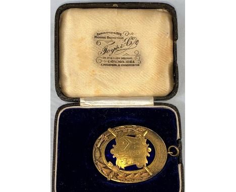A 19th century masonic jewel in gilt metal and blue enamel, in original box 