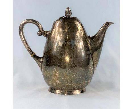 A Swedish Art Deco period coffee pot of ovoid form with planished decoration and floral finial by H. Karelfelt 14.5oz (447gm)