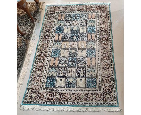 A modern hand knotted Persian rug with square panel decoration 