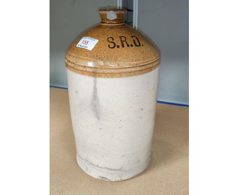 A WWI stoneware rum ration flagon marked S R D, partial cork and chip to rim, height 31cm 