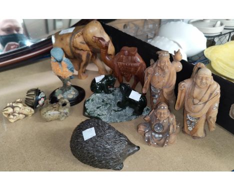 A Canadian carving of 2 bears on a rock in jade coloured hardstone; other animal figures; etc. 