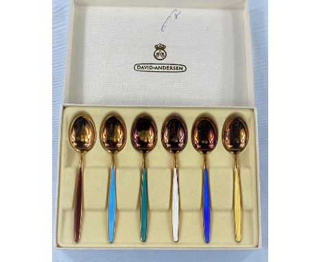 A set of 6 silver gilt Norwegian teaspoons with coloured enamel stamps, by David Anderson. 