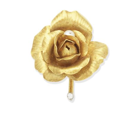 CARTIER: CULTURED PEARL AND DIAMOND-SET ROSE BROOCH,  1963The 18 carat gold rose decorated with a cultured pearl bead and a b