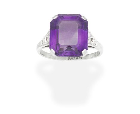 AMETHYST AND DIAMOND RINGThe octagonal-cut amethyst, between single-cut diamond shoulders, ring size approx. M½For further in