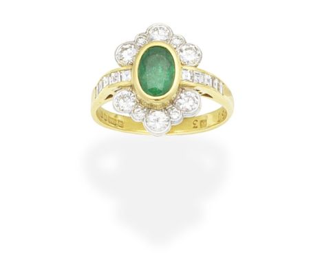 EMERALD AND DIAMOND CLUSTER RING, 1993The oval-cut emerald within a brilliant-cut diamond surround, the shoulders set with sq