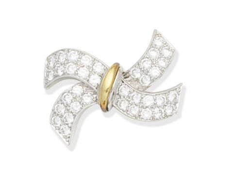 DIAMOND BROOCH, 1988Of crossover design, pavé-set with brilliant-cut diamonds, mounted in 18 carat white and yellow gold,  di