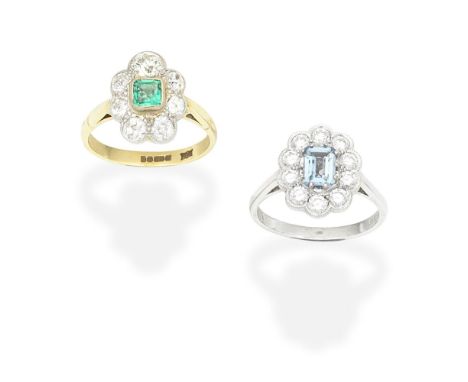 EMERALD AND DIAMOND CLUSTER RING; AQUAMARINE AND DIAMOND CLUSTER RING1st: The step-cut emerald within a cushion-shaped diamon