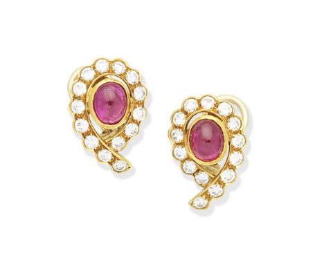 RUBY AND DIAMOND EARCLIPSEach set with an oval cabochon ruby, within a scrolling surround of brilliant-cut diamonds,  diamond