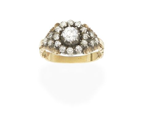 DIAMOND CLUSTER RING, 19TH CENTURYThe old brilliant-cut diamond within a surround of cushion-shaped diamonds, closed back pin