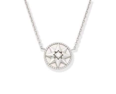 DIOR: 'ROSE DES VENTS' MOTHER-OF-PEARL NECKLACEThe compass rose pendant accented with a brilliant-cut diamond, set with mothe