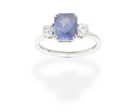 SAPPHIRE AND DIAMOND THREE-STONE RINGThe octagonal-cut sapphire between cushion-shaped diamonds, ring size approx. KFor furth