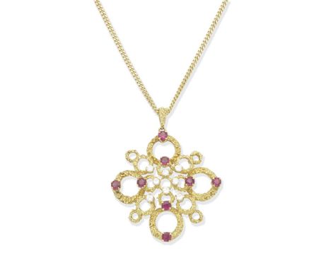 RUBY AND DIAMOND PENDANT/NECKLACE, 1975The openwork cartouche of textured finish, set with circular-cut rubies and brilliant-