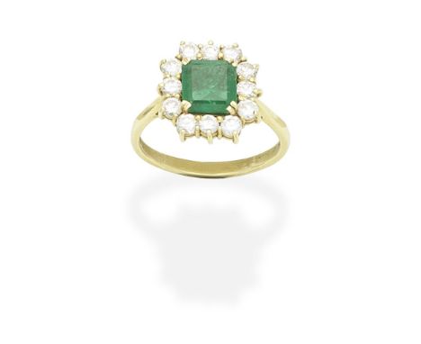 EMERALD AND DIAMOND RING, 1981The step-cut emerald, within a brilliant-cut diamond surround, mounted in 18 carat gold, diamon