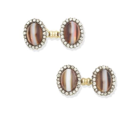 BANDED AGATE AND DIAMOND CUFFLINKSDouble-sided, each with a banded agate cabochon within a rose-cut diamond surround, length 