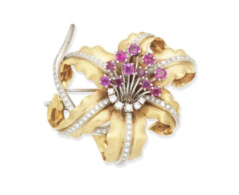 RUBY AND DIAMOND FLOWER BROOCHBicoloured, the petals of engine-turned finish, set with single and brilliant-cut diamonds, the