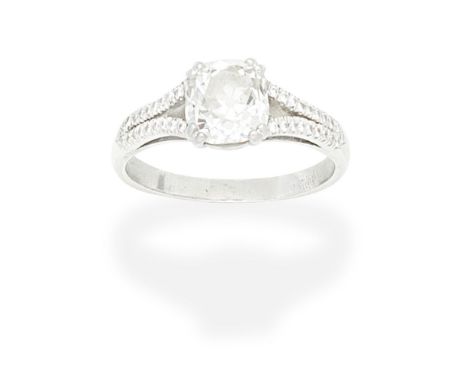 DIAMOND SINGLE-STONE RINGSet with a cushion-shaped diamond, between bifurcated brilliant-cut diamond-set shoulders, mounted i