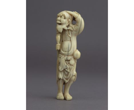 An 18th century Japanese netsuke from Edo period. Not signed. In carved ivory portraying sennin Chokaro walking, 84,9x32,1x19