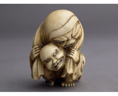 A 19th century Japanese netsuke from Meiji period. Signed Masayuki on a side with a kakihan. In carved elephant ivory portray