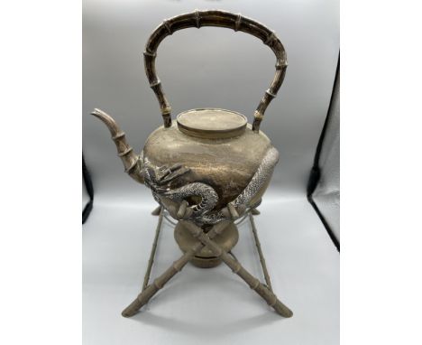 19th Century Chinese Silver Spirit Kettle. Weight of teapot is 769gr, weight of stand 425gr. Total Height 33cm x Width 24cm
K