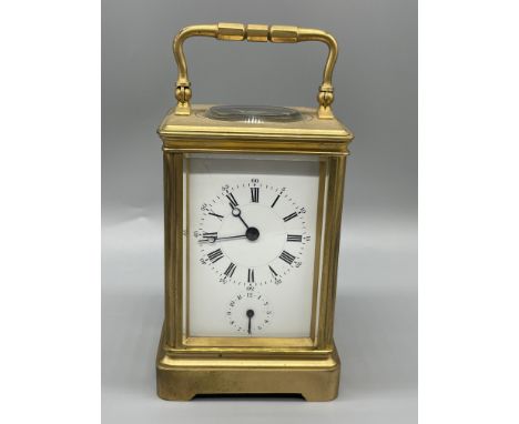 Carriage Clock on Bell 14cm x 8cm x 7cmin good clean condition, original platform and in working condition, would benefit fro