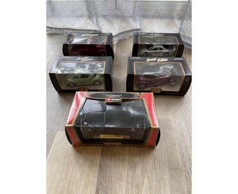 Five Special Edition 1.25 Scale Maisto and Burago Boxed Cars
All in very good condition