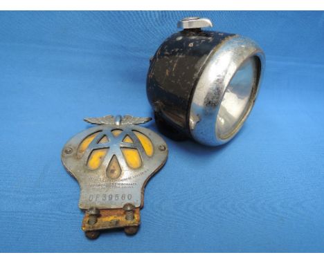 A vintage cycle/motorcycle front lamp, Lucas 'King of the Road' and a vintage AA car badge
