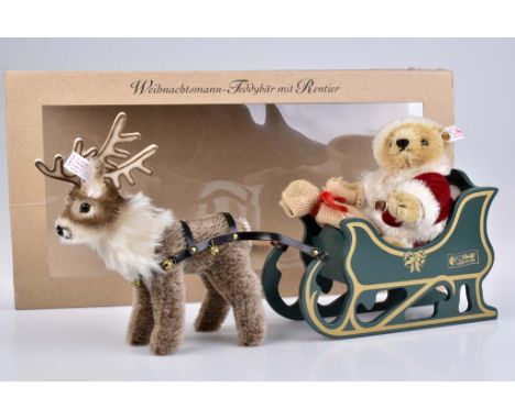   STEIFF Weihnachtsmann-Teddybär mit Rentier   Father Christmas Teddy Bear with Reindeer, limitierte Club-Edition, mit Zertif