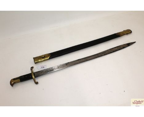 A British model 1855 Lancaster sword bayonet with brass mounted leather scabbard, this example with unit marks for R.A.M.C.