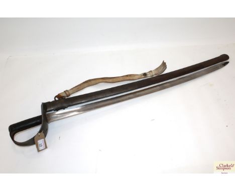 A model 1885 British Cavalry sabre with scabbard. First issue date on blade 8/86 with scabbard marks Y/HTF (NB. grips AF)