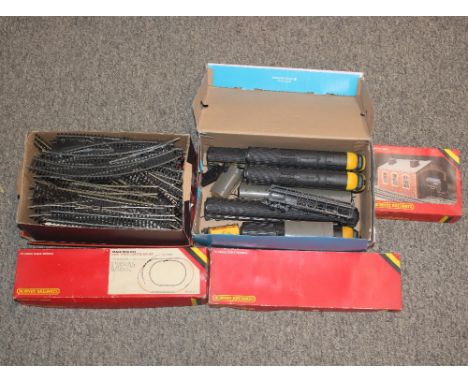 A collection of various Lima locomotives, coaches and rolling stock; various accessories to include Duet transformer controll