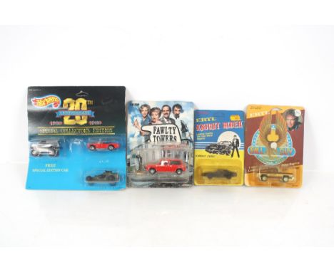 A Corgi BBC Fawlty Towers model; another for ERTL Fall Guy; Hot Wheels Special Collection 20th Anniversary pack and an ERTL K