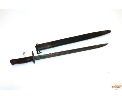 A model 1917 Enfield bayonet by Remington with scabbard 