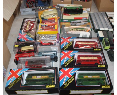 A Corgi Classic Ipswich Corporation Karrier W trolley bus (boxed) advertising "Tolly Cobbold"; another similar unboxed; two C