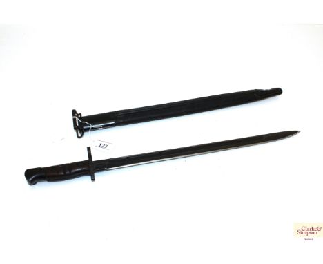 A model 1917 Enfield bayonet by Remington with scabbard 