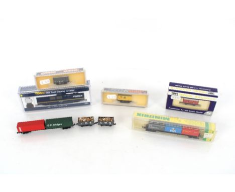 A Tomix 6421 track cleaning car; a Minitrix boxed wagons; a Wren N Gauge 740 boxed wagon; a Lima N Gauge boxed wagon; a Dapol