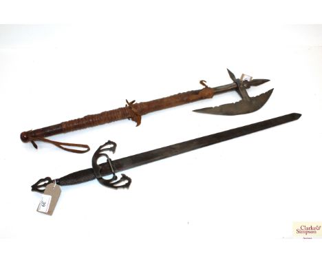 A decorative axe with a decorative sword