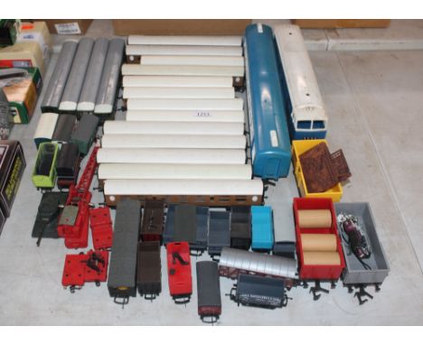 Various Tri-ang plastic coaches; a Hornby OO Gauge crane, flat bed trucks etc; Lima and other plastic bodied coaches, rolling