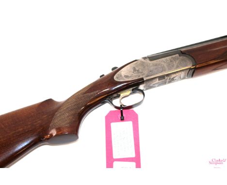 An Emilio Rizzini 12 bore O/U side plate ejector shotgun S/No. 63958, 28" barrels, multi-choke, with two extra chokesNB. This